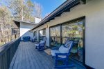 Porch with rocking chairs & grill